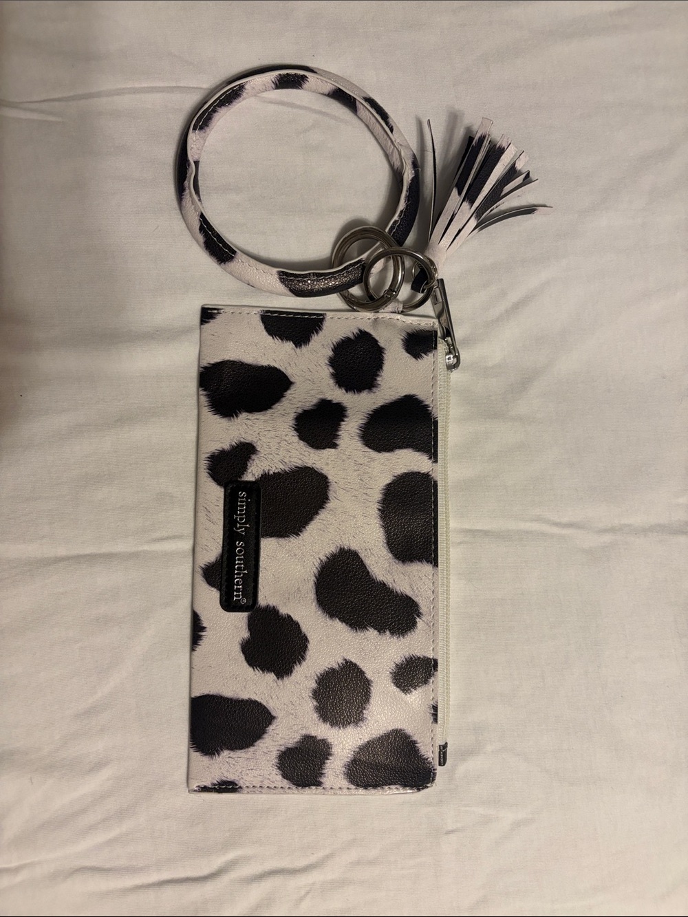 Simply Southern Black and White Cow Print Wristlet with Tassel